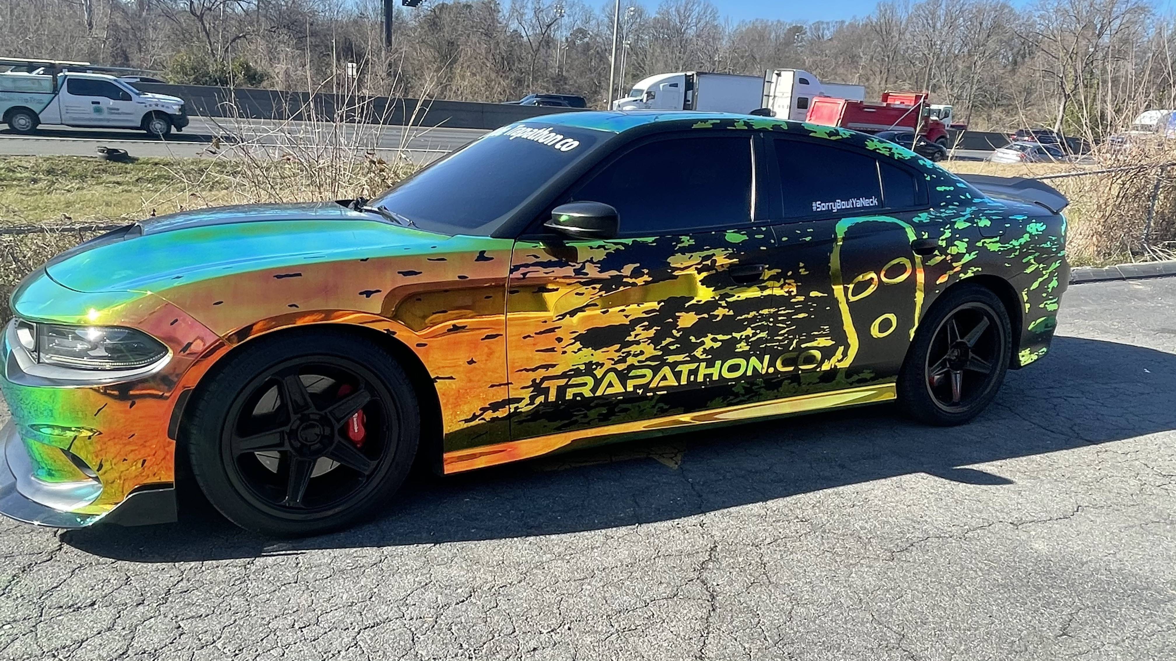 Modern vehicle graphics from a car wrapping company create bold visual impact and outstanding curb appeal.